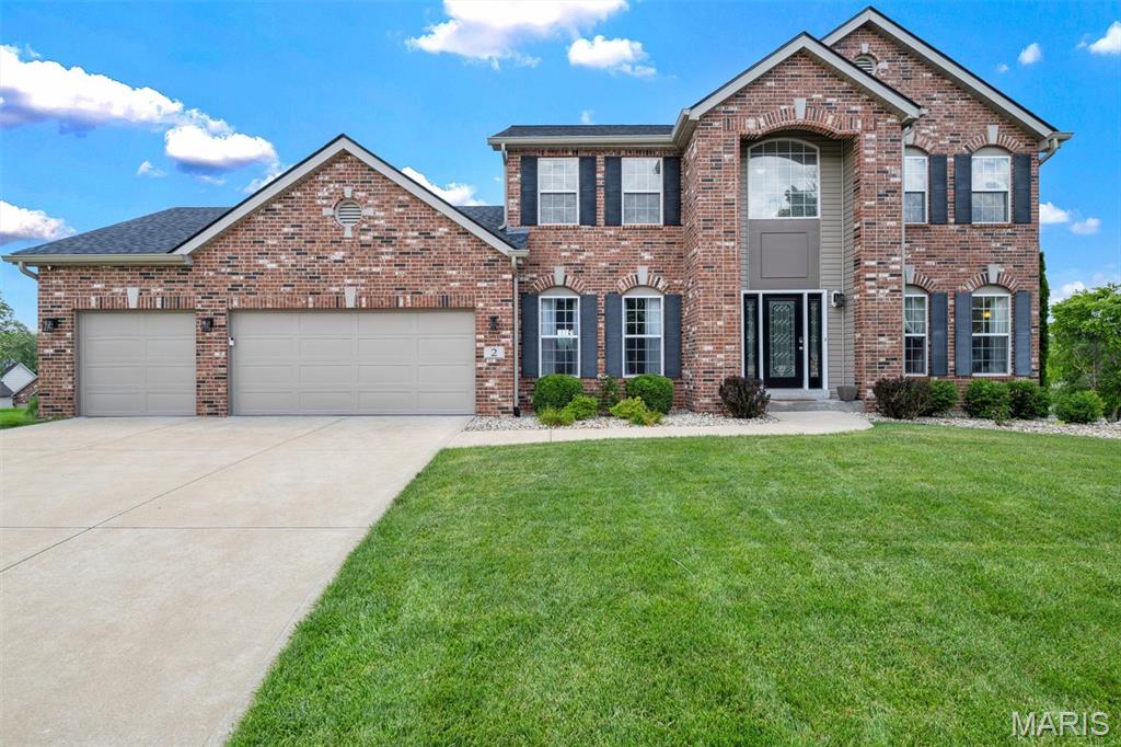 SHOWINGS START FRIDAY, JUNE 19TH!!    100% MOVE-IN READY!  BRAND NEW COMPOSITE ROOF! NEW HVAC! NEW GARAGE DOOR!  FORT ZUMWALT SCHOOL DISTRICT.  WELCOME HOME TO YOUR 4 BR, 3.5 BA 2 story on a CUL-DE-SAC!  NEW flooring on the main level.  Kitchen boasts granite counters & tile backsplash, 42 inch cabinets with crown molding, newer appliances, center island, breakfast bar and planning desk. Elegant and spacious Dining Room with coffered ceiling & wainscoting, perfect for hosting holidays! Formal living room, currently being used as an office.  Bright bayed FAMILY ROOM with cozy gas fireplace, ready for those winter nights. ENTER into your large master suite with double doors, a large walk-in closet and plenty of space to relax and unwind.  Tiled floors in upper baths. Impressive top-quality finished Lower Level with WALKOUT offers living & sleeping spaces, kitchenette with built-in refrigerator, birch wood feature wall & FULL BATH with tiled rain shower & ceramic tile floor.  LARGE MAIN FLOOR LAUNDRY.  OVERSIZED AND FINISHED 3 car garage with epoxy floor, track lighting and 2 fans. Enjoy beautiful sunsets from upper deck & shaded relaxation from Lower Level patio. SPRINKLER SYSTEM. Beautifully manicured landscaping! Tranquil subdivision with stocked lakes for fishing & wooded trails. REFRIGERATOR AND WASHER AND DRYER ARE STAYING!  COME SEE TODAY!  THIS ONE WON'T LAST LONG!