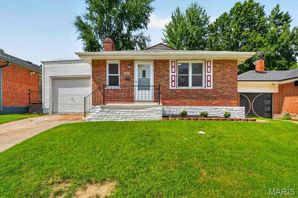 Beautifully updated and completely move-in ready, this brick bungalow is priced to sell! This 2-bed, 1-bath home blends classic charm with major modern upgrades. The completely renovated kitchen features new stainless steel appliances, a new backsplash, and a pass-through counter. The bathroom is stylishly updated, and there are many new vinyl windows throughout for great energy efficiency. Enjoy beautiful hardwood floors and a cozy wood-burning fireplace in the living/dining space. The clean, dry basement offers laundry hookups, tons of storage space, and flexible space perfect for a home gym, gaming setup, or bonus room.

Valuable updates include a new main plumbing stack, and you’ll step outside to a brand-new wrap-around deck overlooking a spacious backyard. Includes a 1-car garage and offers a prime location with quick access to I-70 and Jennings Station Rd. Don't miss this turnkey opportunity!