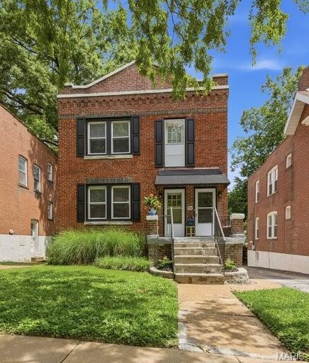 Here is your chance to own a quality, solid-brick duplex in the sought-after Westmoor Park neighborhood. Whether you are looking to expand your portfolio, or become an owner/occupant, this well maintained property has 2 spacious units with a current vacancy for the perfect "house hacking" opportunity.  The building features 2 new HVAC systems (June 2026), sewer/lateral lines under basement floor have been fully replaced (2026), newer double hung windows, and newer hot water heaters make for a turn-key experience.  High ceilings, refinished floors, and original stain glass windows add to the historic charm.  Each tenant has dedicated laundry in the shared basement along with extra storage. 1st Floor tenant pays $1550/mo.  Richmond Heights - a blend of small-town charm with urban amenities!