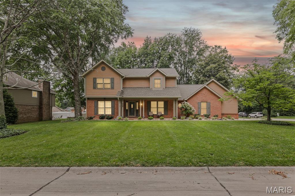 Beautifully maintained 4-bedroom, 4-bath home on a corner lot in sought-after Woodridge Estates. Bright, spacious layout features formal living and dining rooms, an eat-in kitchen with island, maple cabinets, granite counters, stainless steel appliances, hardwood floors, sun room, main-floor office with built-ins, bath, and laundry. Upstairs offers 3 guest bedrooms plus a private primary suite with walk-in closet and en-suite bath. Finished lower level includes rec room, family room, wet bar, full bath, and bonus room. Professionally landscaped yard with stamped patio and outdoor fireplace, plus oversized garage and 3-car driveway. Major updates include furnace/A/C, roof, windows, gutters, fence, and sump pump.
