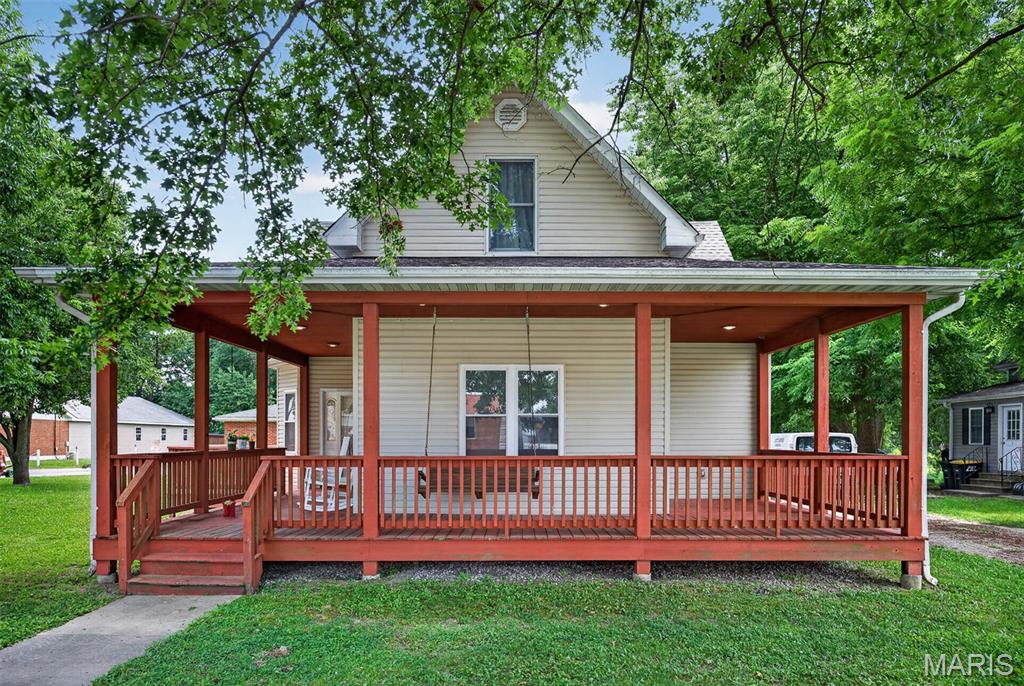 Listing will go active 7/13. Welcome home to this beautifully updated 1.5-story farmhouse full of timeless charm and modern conveniences, situated on a sprawling 1+ acre lot in the highly sought-after Highland School District! Offering 3 bedrooms, 2 full bathrooms, and an abundance of character, this property delivers the perfect blend of peaceful country living with the convenience of a great location.Step onto the inviting wraparound front porch and into a spacious main level featuring a large living room, generous dining area, and an updated kitchen complete with granite countertops, stainless steel appliances, and ample cabinetry. The main-floor primary bedroom and full bath provide added convenience, while the mudroom with built-in storage helps keep everything organized. Durable laminate flooring and numerous updates throughout make this home truly move-in ready.Upstairs, you'll find two additional bedrooms, an oversized full bathroom, and a versatile bonus space that's ideal for a home office, playroom, reading nook, or hobby area. A mini-split system keeps the upper level comfortable year-round.Outside is where this property truly shines! Not only is there a 2 car detached garage but there is an oversized pole barn with 2 tall garage doors that offers endless possibilities for storage, hobbies, vehicles, or equipment. Inside the pole barn is a heated and cooled workshop with an owned propane tank and roughed in plumbing for a bathroom makes it the perfect space for projects in every season. A brand-new roof provides added peace of mind for years to come.Whether you're relaxing on the wraparound porch, enjoying the expansive yard, or taking advantage of the incredible outbuilding, this property offers the space, charm, and flexibility you've been searching for. Experience the best of small-town living with room to spread out—all while being conveniently located. Don't miss your opportunity to make this exceptional property your next home. Sale is contingent upon the sellers finding and closing on suitable housing of their choice. Buyer/agent to independently verify all info. Video/audio surveillance in use. Pool not included.