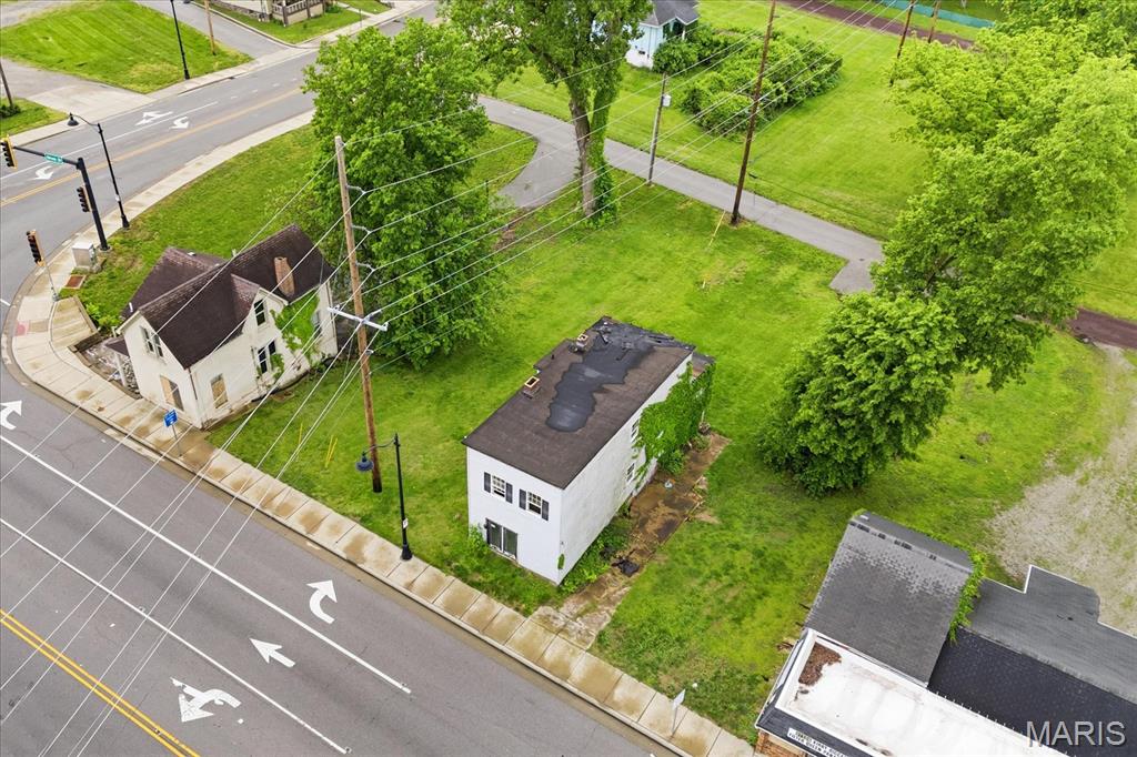 607, 613, & 615 N Illinois St. present a unique opportunity to acquire three prime development lots in downtown Belleville for $75,000. Just steps from the Belleville Square and Main Street shopping, dining, and entertainment district, these multifamily-zoned properties are ideal for investors and developers. Builder plans are available to help expedite future development. The area is experiencing growth, with potential TIF and grant opportunities for qualified projects. Buyers are encouraged to confirm all zoning and development possibilities with the city. Additionally, a city-owned lot at 611 N Illinois St, located between the other two lots, may be available for purchase to expand the development footprint. This central location, close to amenities and major commuter routes, makes these parcels a valuable investment as multifamily-zoned opportunities in this area are increasingly rare.