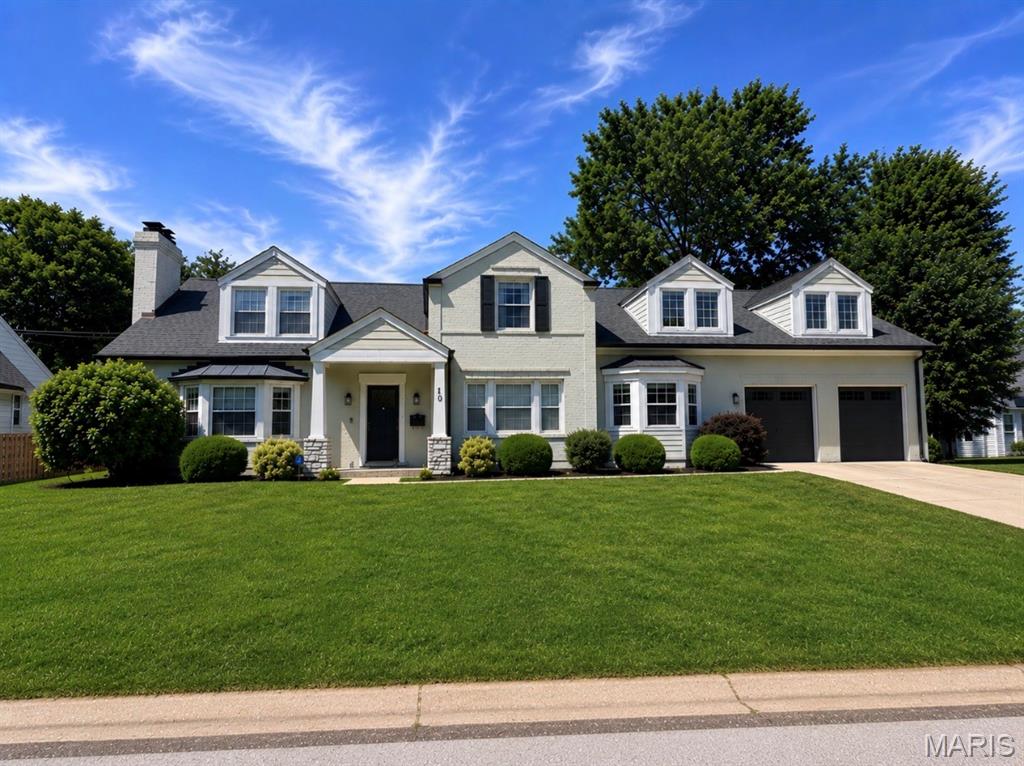Beautifully renovated four-bedroom, one-and-a-half-story home in sought-after Richmond Heights with access to highly regarded Brentwood Schools, offering approximately 4,300 square feet of finished living space across three levels. The updated kitchen features solid surface countertops, stainless steel appliances, gas cooktop, breakfast bar, tile flooring, and ample workspace for everyday living and entertaining. The spacious main-floor primary suite offers two walk-in closets and a luxurious bath with marble tile flooring, double granite vanities, jetted tub, and oversized glass-enclosed shower. Inviting living room with bay window and custom built-in bookcases, plus a warm family room anchored by a wood-burning fireplace with brick surround. Main-floor laundry and mudroom includes tile flooring, cubby area, and excellent storage. Upstairs offers three additional bedrooms along with an expansive 36x24 family room or playroom. Finished lower level includes a playroom and home theater. Additional features include wood floors, crown molding, recessed lighting, and a fenced level backyard. Exceptional curb appeal, move-in condition, and convenient access to highways, shopping, restaurants, and Clayton. A truly exceptional offering.