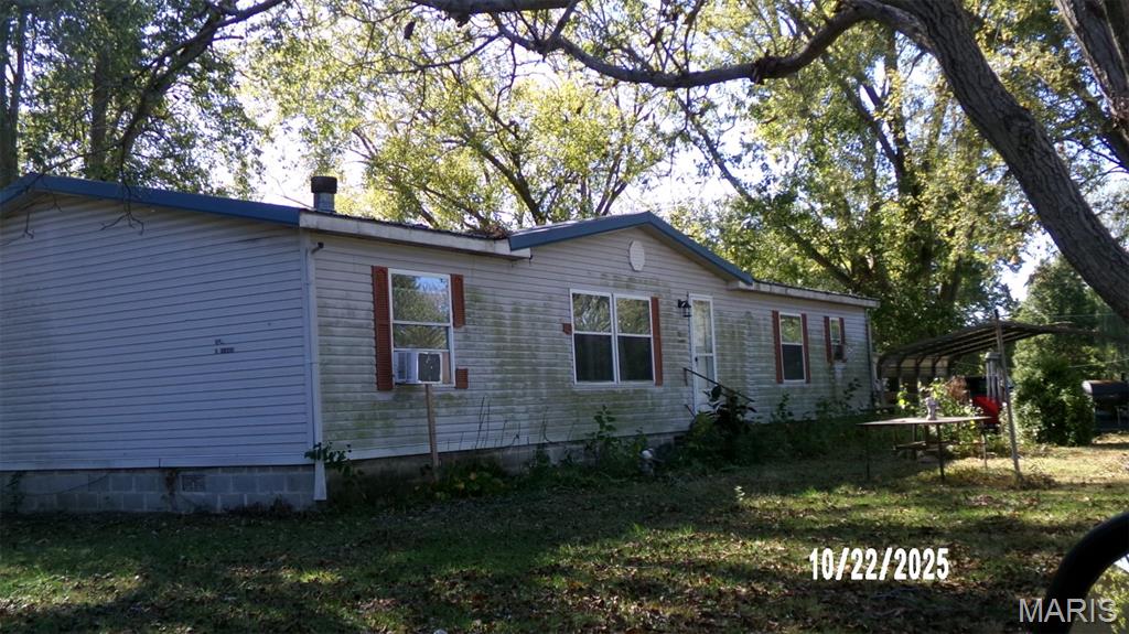 This is a 3 Bedroom 2 Bath Manufactured home on a Full foundation. It has a large Great room, Dining room & kitchen on its own lot.  Sold AS IS..    Please contact your Real Estate agent to view this property or to make an offer..