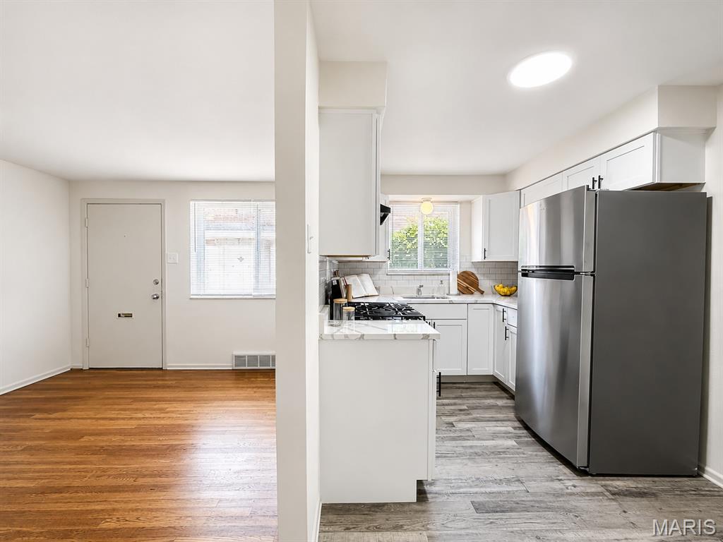 For more information and to receive instant, efficient service, please do not hesitate to contact us today at 314-240-5000!!!

This first-floor, direct-entry one-bedroom offers the perfect combination of comfort and style. The unit features gleaming hardwood floors and a beautifully updated kitchen with white shaker cabinetry, brand-new stainless steel appliances, and quartz countertops.

This property offers clean on-site laundry, off-street parking, updated windows, and central heat and air. Water, sewer, and trash are included; a monthly $35 utility fee applies. Conveniently located in South County near shopping, restaurants, and major highways.

Our professional management team caters to your needs with prompt, friendly service all at an affordable price. Come visit our pet-friendly community today!

Stop looking and start renting!