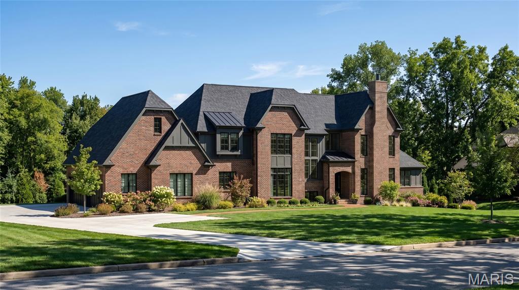 Build The Hawthorne on Manor Hill. A remarkable transitional estate designed for those who appreciate timeless architecture, exceptional craftsmanship, and a home tailored to the way they live. Offering over 6,375 square feet of thoughtfully designed finished living space on a picturesque 1.3-acre homesite, The Hawthorne I blends sophisticated design with everyday comfort.

A dramatic two-story foyer creates a stunning first impression with its grand staircase, soaring ceiling heights, and abundance of natural light. Beyond, the impressive great room showcases a vaulted ceiling with decorative beam details and expansive walls of windows, creating a bright and inviting atmosphere that seamlessly connects the home's main living spaces.

Designed with both grand entertaining and comfortable daily living in mind, the gourmet kitchen serves as the heart of the home with extensive custom cabinetry, a substantial center island, premium appliance options, and direct access to a covered outdoor living area ideal for year-round enjoyment.

The private main-level owner’s retreat offers a luxurious sanctuary featuring a spa-inspired bath with a freestanding soaking tub, oversized zero-entry shower, and expansive walk-in closet. Throughout the main level, 10-foot ceilings, wide-plank hardwood flooring, and custom architectural millwork showcase the level of craftsmanship and detail expected in a Kemp Signature Homes estate.

The upper level includes three spacious ensuite bedrooms, a flexible loft area, and a convenient second-floor laundry room. The finished lower level extends the home’s extraordinary livability with a large recreation room, walk-up wet bar, private guest suite, and full bath, with additional opportunities to personalize spaces for a fitness studio, golf simulator, wine cellar, theater, or other lifestyle amenities.
Set on a beautiful 1.3-acre homesite with room for a future pool, expansive patios, and exceptional outdoor living, this is a rare opportunity to create a fully customized luxury residence in one of the area’s most desirable settings.

Personalize The Hawthorne I with your own architectural selections, finishes, and design details. Floor plans, luxury features, and customization opportunities are available upon request. Renderings and photography may depict optional features, upgrades, and selections not included in the base offering. Pricing does not include swimming pools or specialty site improvements.