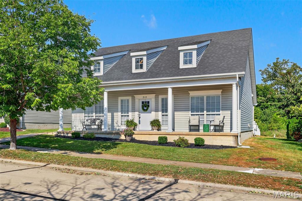 Welcome to this beautifully maintained 3bd/2bth split floorplan home! This home offers exceptional curb appeal from the inviting front porch, mature trees and landscaping. 312 Hawks View Dr. offers a practical and welcoming layout with plenty of natural light and comfotable living space. This Zero entry home offers no steps to the front door, back door or garage. A huge walk in primary shower adorns the spacious primary bathroom. Excellent fenced in back yard with oversized patio perfect for an outdoor gathering space. Easy access to shopping, walking trails, gyms, restaurants and highways, A wonderful opportunity for buyers looking for a charming, welcoming home with character and great curb appeal.
