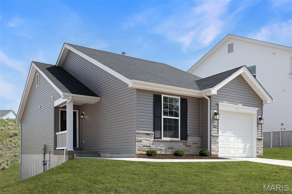 New McBride Homes Summerfield ranch-style 2BR, 1BA is ready now! Partial walkout homesite! Perfect for entertaining with vaulted ceilings, 6ft windows & beautiful wood laminate flooring in main areas. Kitchen features level 4 Benton Painted White 42” tall cabinets, quartz countertops, large peninsula w/ breakfast bar, & stainless GE appliances. Large living room w/ceiling fan & sliding glass door to backyard. The primary suite features large window, dual closets, and ceiling fan prewire. The bathroom has a double sink vanity & 5’ walk in shower. White two panel interior doors, upgraded lighting w/ceiling fan prewire in additional bedroom, main floor laundry, & 1 car garage. LL includes a ¾ bath rough-in for future finish. Located in House Springs, this community features 263 homesites off Bear Creek Road, just east of Gravois Road and Carol Park Road. Enjoy peace of mind with McBride Homes’ 10 year builders warranty and incredible customer service! Display photos shown.