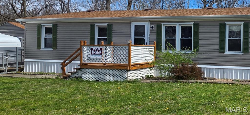 DUE TO POPULAR DEMAND, offers will be accepted on this mobile home through Thursday, March 26 at 5 pm. Seller will review all offers and reply by Friday 5 pm. Here's a super clean, super low maintenance 1997 Fleetwood double wide mobile home with a garage, carport and fenced back yard! The lot is rented from Town & Country Management for $480 a month and includes water, sewer and trash. You won't find many set ups like this one and it has a private backyard with view of trees and extra large concrete pad. Please allow 24 hour notice as we have pets and it's occupied. Seller is very motivated. Let this beautiful home begin your path to home ownership! Great place to start!