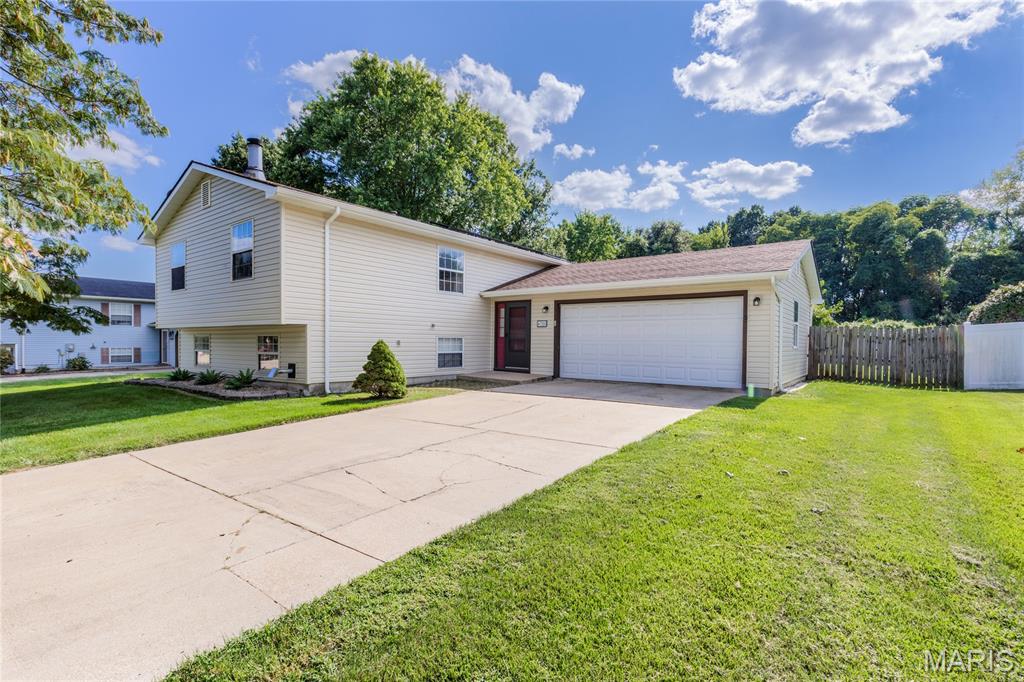 Are you looking for that move in ready contemporary spacious home with all the perks and benefits to allow you to live as economically as possible? Welcome to 4708 Storeyland Drive! This roomy split foyer floor plan offers 4 bedrooms, 3 bathrooms, a quarter acre lot, solar energy plus an in-ground salt water pool. HVAC additions include a pellet stove and a lower level wood burning fireplace in the hearth room. Main level kitchen and family room space walks out to a pool side deck and patio for tons of relaxation and alfresco dining opportunities. A large open cook's kitchen sports eat-in space plus plentiful storage and countertop work space! Tons of updates! New 30 year architectural shingle roof 2012. New vinyl siding & gutters in 2026.  18' x 26' in-ground saltwater pool with liner & cover, 8 years old, with 20 year warranty. New pool pump 2026. New Furnace & HWH 2024. Dishwasher 2026.