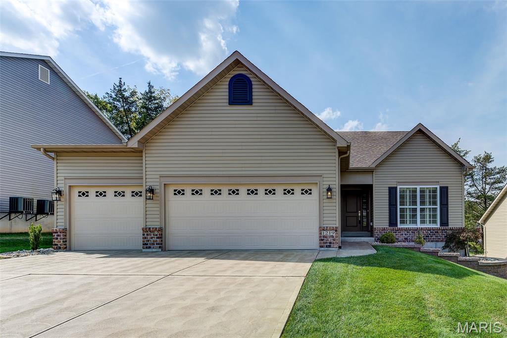 Exquisite Flower & Fendler-built ranch, just eight years young, offering exceptional craftsmanship, a three-car garage, and a prime location minutes from Highways 141, 44, 40, and Manchester Road. Designed for both comfort and elegance, the open-concept, divided-bedroom floor plan showcases soaring 12-foot ceilings throughout the kitchen, breakfast room, and great room, creating a spacious and inviting atmosphere.  The current owner has further enhanced the home with an impressive array of premium upgrades, including smart lighting, vinyl privacy fencing, plantation shutters, lever door hardware, surround-sound wiring, professional landscaping with retaining wall, an in-ground sprinkler system, central vacuum, gas line for outdoor grilling, and a Nest thermostat. The immaculate, heated three-car garage features hot water access and a durable Perma-Seal floor finish.  At the heart of the home is a chef-inspired kitchen that seamlessly blends beauty and functionality, featuring top-of-the-line JennAir appliances, granite countertops, custom cabinetry, and upscale hardware. Additional highlights include a gas fireplace, wide-plank engineered wood flooring, transom windows, and a custom closet organization system in the luxurious primary suite.  Meticulously maintained and truly move-in ready, this remarkable property is located within the highly acclaimed Parkway School District and offers the perfect combination of quality, style, and modern convenience. A rare opportunity to own a thoughtfully upgraded home in an outstanding location.