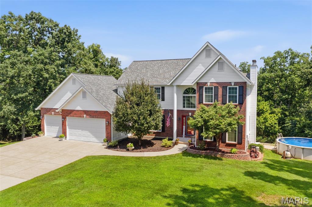 Exceptional opportunity to own, a custom built 2 story home loaded w/ updates on beautiful 2-acre wooded lot. This meticulously maintained home is thoughtfully designed for both comfort, sophisticated living. The heart of the home has the highly desired open-plan kitchen/family room concept. The gourmet kitchen features an abundance of white cabinets, new stainless appliances, wood floors, & a G-shaped layout w/ a peninsula seamlessly flowing through the breakfast room into the family room. Here, a welcoming fireplace creates an inviting atmosphere for gatherings or quiet evenings. Upstairs you will find well- appointed primary suite offering 1 spacious walk-in closet AND 2 additional closets. Adjoining primary bath offers a jetted bathtub, a double bowl vanity, and walk in shower providing a spa-like retreat. Spectacular views from the windows on back of the home can be seen from many of the rooms in the home. The lush outdoor green space is a refreshing oasis for escape and relaxation. Take a dip in the newer above ground pool on those hot summer days. Gather with friends and family on the large composite wood deck and take a break from the hot sun under the spacious covered patio. There is a new (2025) TUFF shed for extra storage or working on your hobbies.  Some of the many updates include 30- year architectural shingle roof 2024, new gutters, downspouts 2024, new siding 2024 (1/3rd of the home), new exterior doors, new WINDOWS (whole home) & MORE!  Power outages? Not here! Home has a fully equipped Generac generator (2024) included in the sale!! Zero internet interruptions during storms!! Too many to list. Please find the Home Improvement with list of all the improvements, the seller has done during their ownership in the supplements. Seller is providing a 1 yr home warranty to buyer at closing !! Hurry! Your dream home awaits!!