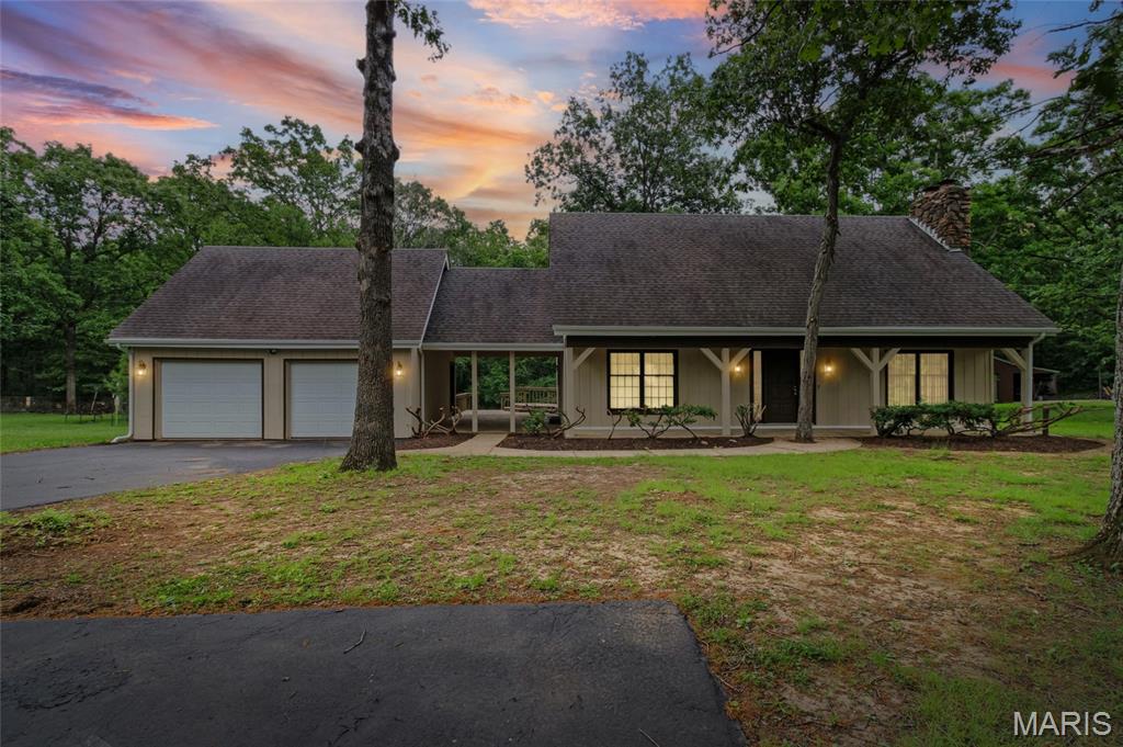 Welcome home to this beautiful completely renovated home nestled in a quiet serene oasis. Your new home boasts a 2 story entry leading
to the separate living room with fireplace for cool winter evenings. Enjoy family gatherings in your separate dining room with deck access and
beautiful updated kitchen with stainless steel appliances and built in wine cooler. The main floor also has a bedroom, full renovated bath and
laundry room. The second level is where you will find two additional bedrooms and fully renovated bath adding to more privacy for you and
your family. Enjoy your outdoor time on a beautiful deck where you get to enjoy nature and tranquility right outside your door. You will find
both luxury and a retreat experience in this beautiful home. Don’t wait to visit, this one will not last!