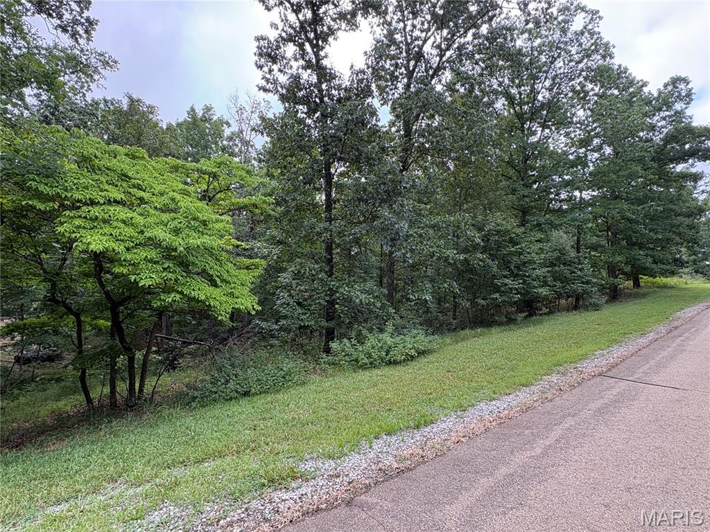 Looking for an affordable way to enjoy the lake lifestyle? This mostly wooded,
unimproved lot is located inside the highly desirable gated community of Lake Perry,
where recreation and relaxation go hand in hand. Spend your days boating, casting a
line, swimming, or simply enjoying the peaceful surroundings. Community amenities
include a 200+ acre lake, swimming pool, clubhouse, beach areas, playgrounds, picnic
areas, volleyball and basketball courts, bath houses, laundry facilities, and so much
more. Bring your vision and make this property your own.