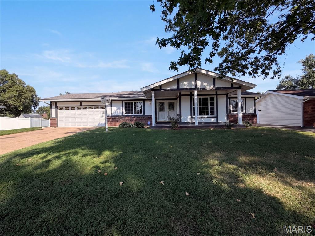 Florissant home with a comfortable single-level layout, generous yard space, and a two-car garage. The main living areas offer a natural flow between the kitchen, dining space, and bright rooms with a mix of hard-surface flooring and refreshed carpeted areas. The kitchen provides practical cabinet storage and room for everyday meals, while multiple bedrooms give the home flexibility for rest, work, or hobbies. Two full baths support daily convenience, and an unfinished basement adds useful storage or future-use potential. Recent interior and exterior touch-ups help create a clean, well-kept presentation. Included 100-Day Home Warranty with buyer activation
