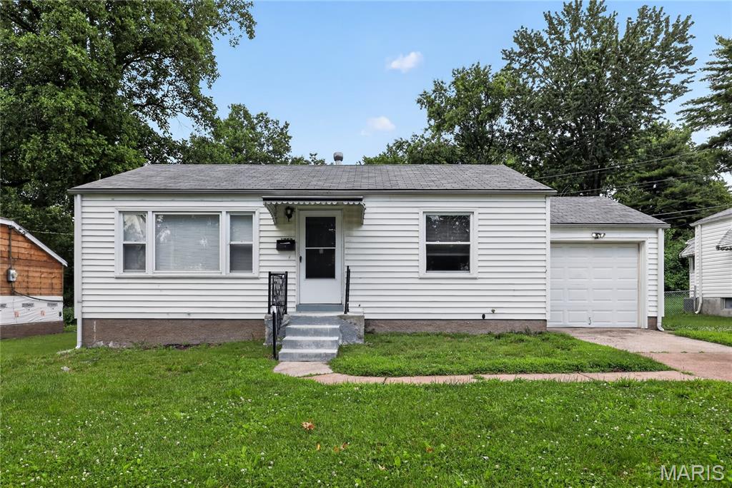 Welcome to this charming 3-bedroom, 1-bath ranch in the heart of Bellefontaine Neighbors! This home boasts gleaming hardwood floors throughout the main level and an inviting, open floor plan perfect for entertaining. The kitchen flows seamlessly into a bright family room, which offers easy access to your private, level, and fully fenced backyard - an ideal space for weekend gatherings. Enjoy the added value of a full, partially finished basement featuring cedar-lined closets and a dedicated laundry area. With a 1-car attached garage, updated roof, and a convenient location near highways and amenities, this well-maintained gem is the perfect place to call home.\