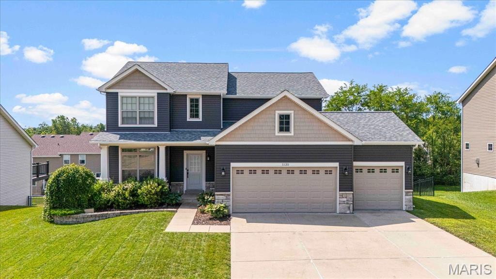 Welcome home to this beautifully updated 2-story with a 3-car garage, finished walkout lower level, fully fenced backyard and composite deck! Step inside to an open floor plan with LVP flooring, tall baseboards & designer finishes. The chef’s kitchen features white shaker cabinetry, a contrasting gray island, granite countertops, subway tile backsplash & breakfast room. The kitchen opens up to the living room with a gas fireplace flanked by custom built-ins. The main level is completed with a private office with a built-in desk & bookshelves, powder room & spacious mudroom with cubbies. Retreat to the primary suite upstairs with a tray ceiling, walk-in closet & ensuite bathroom. Three additional bedrooms, a full bath & convenient 2nd floor laundry complete the upper level. The finished walkout lower level adds additional living space with a large rec space, full bath & custom built-ins. PLUS permanent holiday lighting & newer roof (2024).