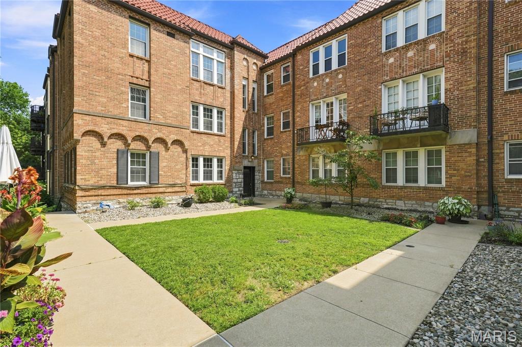 Classic Clayton character takes on a fresh, refined edge in this beautifully updated 2-bedroom, 1-bath condo in the historic Moorlands neighborhood, offering more than 1,100 square feet of stylish, move-in ready living space. Rich hardwood floors, elegant architectural details, and a warm, sophisticated interior with clean lines and timeless finishes create the perfect blend of historic charm and modern comfort. The updated kitchen features quartz countertops, newer appliances, and ample workspace, while the renovated bathroom showcases updated flooring, contemporary fixtures, and a fresh, modern aesthetic.
Recent improvements include a newer furnace, updated lighting, and ceiling fans, providing added comfort and peace of mind. Spacious living and dining areas offer flexibility for everyday living, entertaining, or working from home.
Located in the highly acclaimed Clayton School District, this exceptional condo places you minutes from Washington University, Barnes-Jewish Hospital, SSM Health St. Mary's Hospital, major highways, Downtown St. Louis, and Lambert International Airport. Enjoy the walkable charm, tree-lined streets, and historic architecture that make Moorlands one of Clayton's most sought-after neighborhoods. This is a rare opportunity to own a thoughtfully updated condo in a premier Clayton location with convenient access to shopping, dining, healthcare, higher education, and cultural attractions throughout the St. Louis metro area. This could be the backdrop for your Next Chapter!