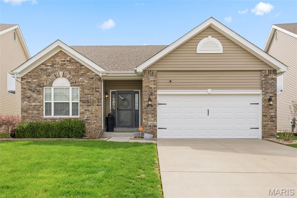 Instant equity with this home already priced below its most recent appraisal! Backyard pavilion with TV, spring lights and furniture are all included! Welcome to this beautifully maintained 2017-built home in the heart of the Charlestowne subdivision, offering 4 bedrooms, 3 full bathrooms, and eye-catching curb appeal. Step inside to an inviting open floor plan designed for both everyday living and entertaining. The kitchen is a true showstopper, featuring stainless steel appliances, a woodblock center island, and a stunning hardwood ceiling that sets the space apart. The main floor also includes a cozy gas log fireplace and a convenient laundry room—with the luxury washer and dryer included. You'll fall in-love with the primary bedroom with its large walk-in closet and jaw dropping bathroom, full of character! Downstairs, the finished basement is built for entertaining, complete with a wet bar, built-in drink refrigerator, full bathroom, bedroom, and additional unfinished storage space. Step outside through the sliding glass doors to your fully equipped backyard retreat—an entertainer’s dream. The custom patio and pavilion comes complete with a TV, string lights, large hanging fan, and patio furniture. Additional features include a 1-year old roof, sump pump, yard irrigation system and radon mitigation system provide peace of mind, while the location can’t be beat—just a golf cart ride away to New Town and only 5 minutes from Orchard Farm High School.