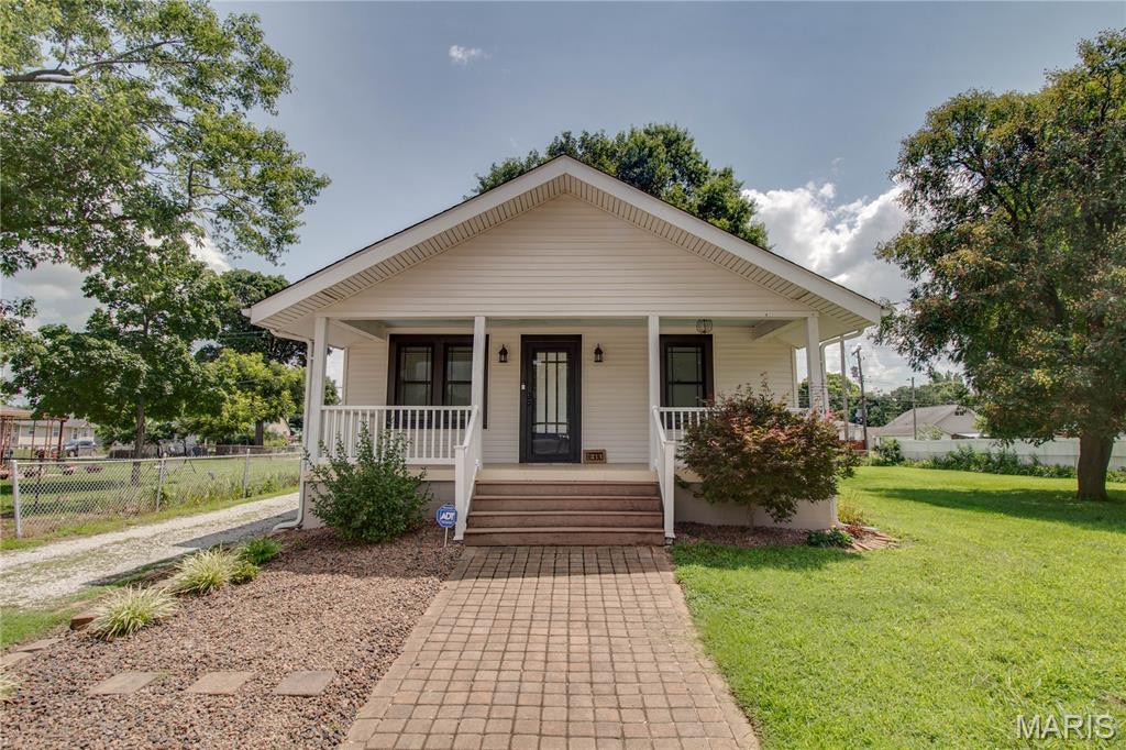 Don’t miss this rare opportunity to own a beautifully updated home with an additional buildable lot! 

This charming 2-bedroom, 1-bath home offers comfortable living space, original character that has been thoughtfully preserved throughout and is full of updates that provide peace of mind for years to come. 

Inside, you’ll find updated flooring, a beautifully remodeled kitchen with modern cabinetry, and an updated bathroom—all completed in 2013. The HVAC system was also replaced. While the roof on both the home and detached garage was replaced in 2019, making this home truly move-in ready. 

The clean basement features durable epoxy floors, offering excellent space for storage, a workshop, home gym, or hobby area. Step outside and enjoy not only the spacious yard but also the included additional 50’ x 128.9’ lot—providing endless possibilities for recreation, gardening, future expansion, or simply extra privacy.

Conveniently located in Wood River near schools, parks, shopping, restaurants, and major highways, this property offers the perfect combination of charm, updates, and value. Opportunities like this don’t come around often—schedule your private showing today and see everything this unique property has to offer!