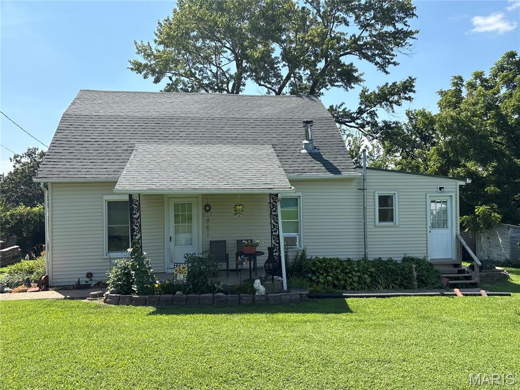 Welcome to your own slice of rural paradise! This beautifully maintained, 3-bedroom, 1-bathroom farmhouse with original hardwood floors, perfectly blends timeless character with some modern updates. Nestled on a little over 3 acres of land with a gorgeous view, this property offers room to breathe and live your country dreams! Enjoy major recent upgrades, including brand new windows, a new front door and storm door, and a new roof over both the kitchen addition and the spacious back deck. Stay warm and worry-free with a new furnace installed in the winter of 2024, plus gorgeous new kitchen flooring completed last year in 2025. The acreage comes alive with stunning, established native flowers that bring vibrant color and local pollinators! Need room for hobbies, tool, or outdoor gear? The property has 4 usable sheds, perfect for workshops or extra storage. Whether you're sipping your morning coffee on the back deck enjoying your beautiful view or tending to the gardens, this farmhouse is rare find that has been loved and cared for over the years!