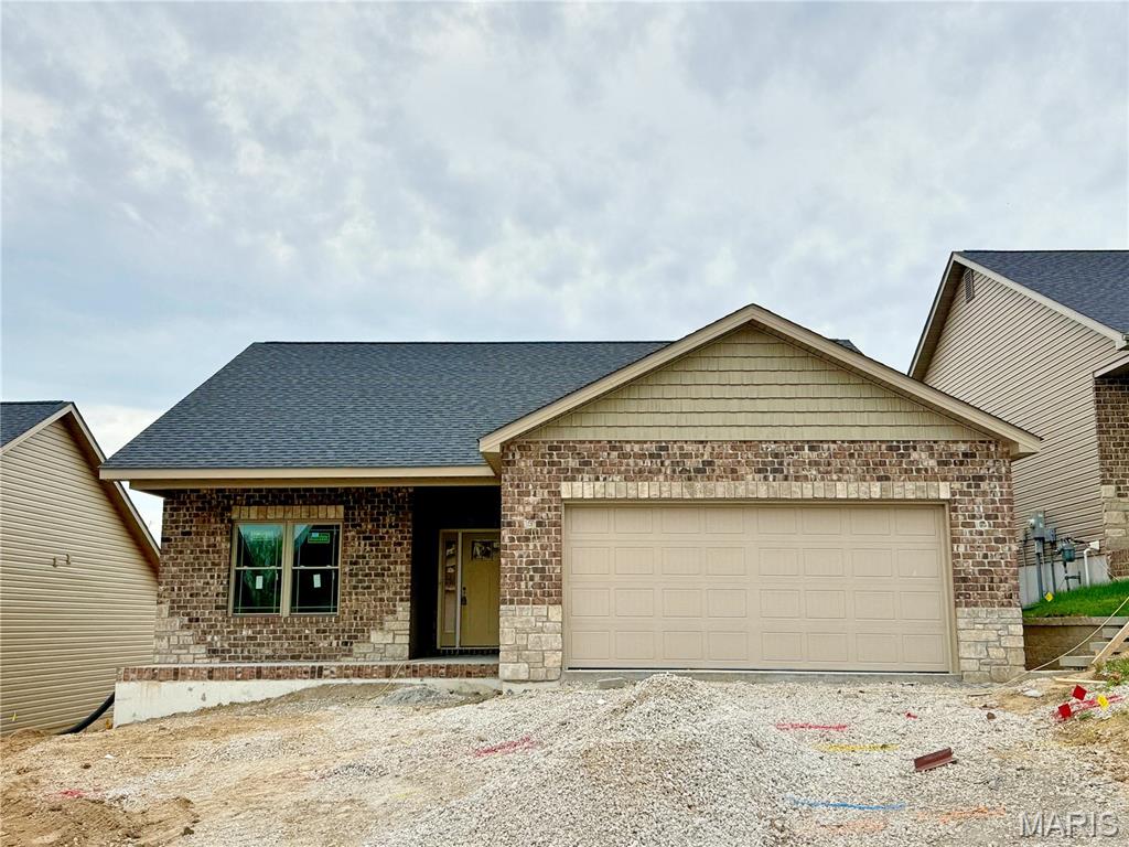 Discover a truly worry-free lifestyle in this brand-new home in Tanglewood’s 55+ community of Villa Valley. Built by Juliet Alpha Properties, this home showcases their signature style with distinctive window casings, designer shelving, durable LVP flooring, and abundant LED and smart motion-activated lighting. The 2-bed, 2-bath, 1,446 sq ft main level feels bright and inviting with an open layout, quartz countertops, 42" soft-close custom cabinets, a vaulted great room, a gas fireplace, and a zero-entry from garage to home. The primary suite offers a large cultured marble shower with bench, dual vanities, and a walk-in closet connected to the laundry room for everyday ease.  The lower level is unfinished and includes an egress window, a bath rough-in, & is full of possibilities. Energy efficient, lifetime basement waterproof warranty, some ADA compliant features, & so much more! Enjoy mornings on the covered deck, or grab your fishing pole and wander down the street to one of Tanglewood’s stocked lakes—just a few steps to the water and trail. Then lock the door and head out of town without a second thought. Lawn care, snow removal, irrigation, and seasonal yard clean-up are all included for only $125/month. Photos shown are of a previously built home by Juliet Alpha Properties.  Finishes will be similar.  This home may be different based on floor plan, customizations, options, and upgrades.  Estimated completion date is July 2026.