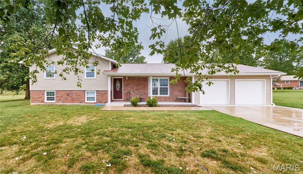 Welcome to 105 Sharon Dr! This beautifully updated 3-bedroom, 2-bath home is situated on a spacious, level 1/2-acre lot in the established Werges Meadows Subdivision. Step inside to a bright, open floor plan featuring a spacious kitchen with a center island, plenty of workspace, and all appliances included. The home has been thoughtfully updated throughout, offering a fresh, move-in-ready feel.

The finished lower-level rec room provides additional living and entertaining space, while a separate office offers the perfect spot for working from home, hobbies, or extra flex space. Outside, enjoy the generous level yard surrounded by mature trees in a quiet, established neighborhood.

To make this home even more appealing, the sellers are offering a $4,000 flooring credit, allowing the new owners to add their own finishing touch. With its updated interior, flexible living spaces, large lot, and inviting location, this Montgomery City home is ready for its next owner!