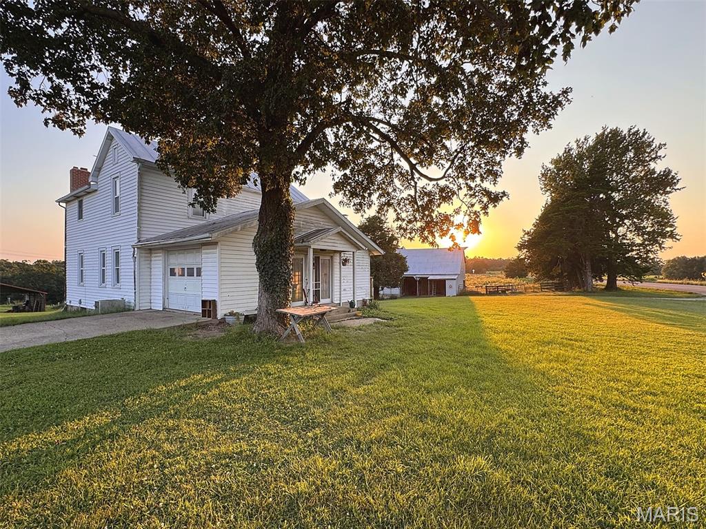 A rare opportunity to own a home and 53.95 acres m/l of established Franklin County farmland in the Franklin County R-2 school district with the infrastructure, timber, water, hunting, and location buyers are looking for. Previously operated as a family cattle and hay operation, this property offers approximately 50% fenced and cross-fenced pasture and 50% mature hardwood timber, with level to gently rolling topography and terraced fields. Five separate pastures provide an excellent setup for cattle, horses, or other livestock.

The recreational opportunities are equally impressive. A small lake, abundant wildlife, mature hardwoods, and adjoining large tracts of land create excellent habitat for deer and turkey. Numerous locations throughout the property offer outstanding options for hunting stands, blinds, and food plots.

A rustic 1,735 sq. ft. farmhouse, originally constructed in approximately 1908, features 4 bedrooms, 2 bathrooms, central heat and air, central air conditioning, 200-amp electric service, metal roof, wood stove, kitchen, dining area, basement with laundry hookups, and garage. The home is in need of repair and updating but offers an excellent opportunity to restore a historic farmhouse and make it your own. It is on a well and septic.

The farm includes an impressive collection of working improvements, including a 36' x 46' 1920s-era barn with hay loft, with newer metal siding and roof; 30' x 50' machine shed with electric including a 220V receptacle for a welder; 18' and 20' lean-tos providing additional hay, equipment, and covered livestock storage; and a three-lot cattle corral surrounding the barn. Additional improvements include a 40' x 24' block workshop with concrete and electric, large dog kennel, two chicken coops with runs, 22' carport, two cisterns, gazebo, and spacious yar

Approximately 2,700 feet of paved Hwy E frontage provides excellent accessibility and adds significant appeal to the property. Located in the highly sought-after Franklin County R-2 School District, residents have the unique opportunity to choose from several area high schools, including New Haven, Hermann, Washington, Union, and Owensville.

This property is being sold AS-IS.  Seller to make no repairs.  

Located just 10 miles from New Haven, and 15 Miles from Hermann this properties features, topography, location, and school district make it a truly unique opportunity that will not last long.  Contact us to schedule your showing TODAY!