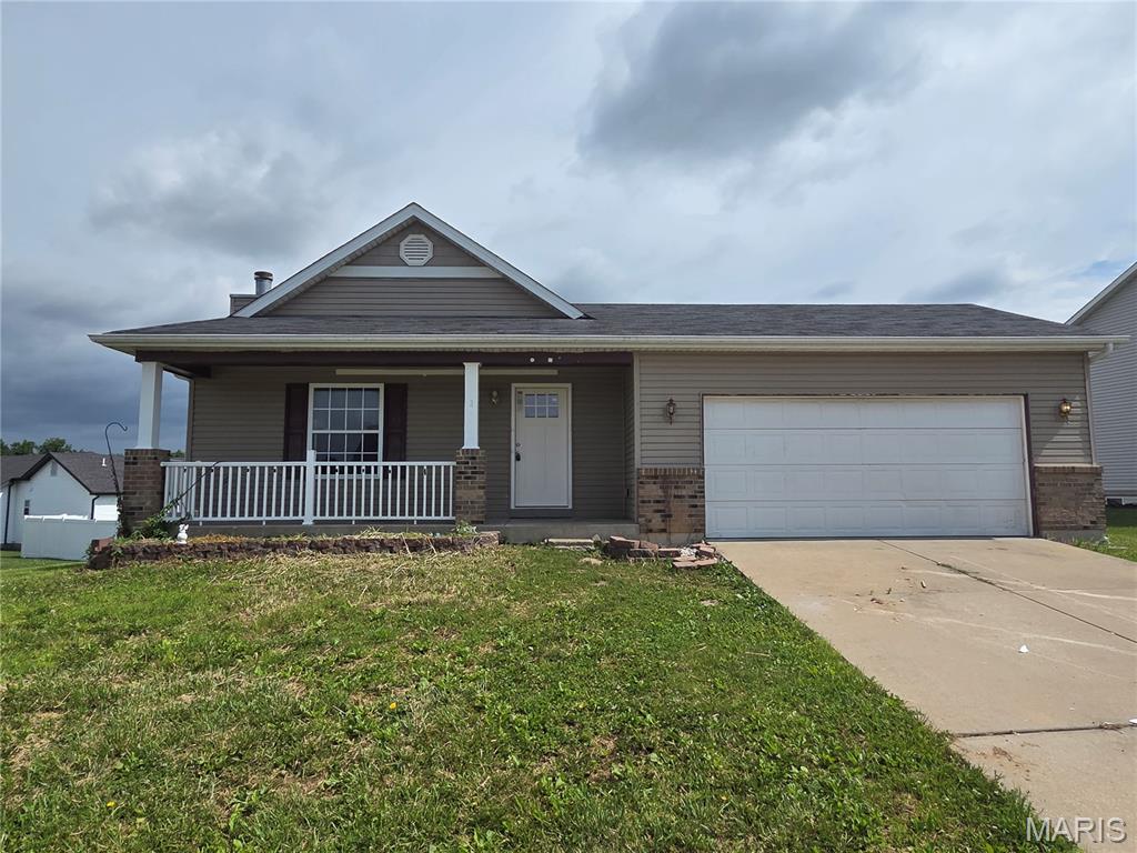 Opportunity awaits in one of the area's most sought-after neighborhoods! This 1,645 sq ft ranch offers 3 bedrooms, 2 full baths, a 2-car garage, and the solid foundation savvy buyers are looking for. With primarily cosmetic updates needed, this home is the perfect canvas for investors, rehabbers, or owner-occupants looking to build instant equity. The spacious unfinished basement provides excellent storage and future expansion potential, complete with a bathroom rough-in for an easy third bath addition. Strong bones, a functional layout, and an unbeatable location make this a rare chance to customize a home to your vision while maximizing value. Property is being sold as-is.