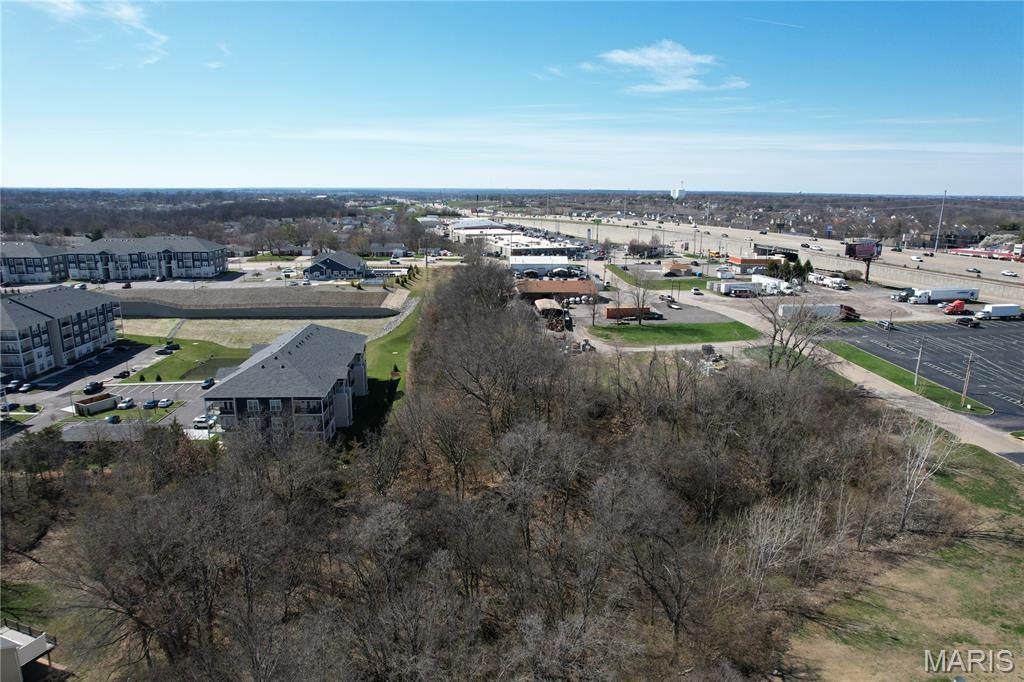 1.5+/- Acre Commercial Tract Near Hwy 364 in St. Peters with strong visibility and quick access just off Jungs Station Rd. This C-3 opportunity is well-positioned for a range of small business and office concepts in a high-exposure corridor. Ideal potential for professional office space, medical or dental office, insurance or financial services, boutique retail, service-based businesses, flex office suites, or a small mixed-use commercial concept, subject to City approval and site plan review. The size and location offer room to create a business presence that is convenient for clients, employees, and daily traffic flow alike. Situated in the City of St. Peters in St. Charles County, this tract benefits from a highly traveled location near major commuter routes, helping support visibility, accessibility, and long-term business potential. Rare chance to secure a commercial site in an established growth area where office and service uses make strong sense. Bring your concept, review the possibilities, and take advantage of this well-located commercial offering.