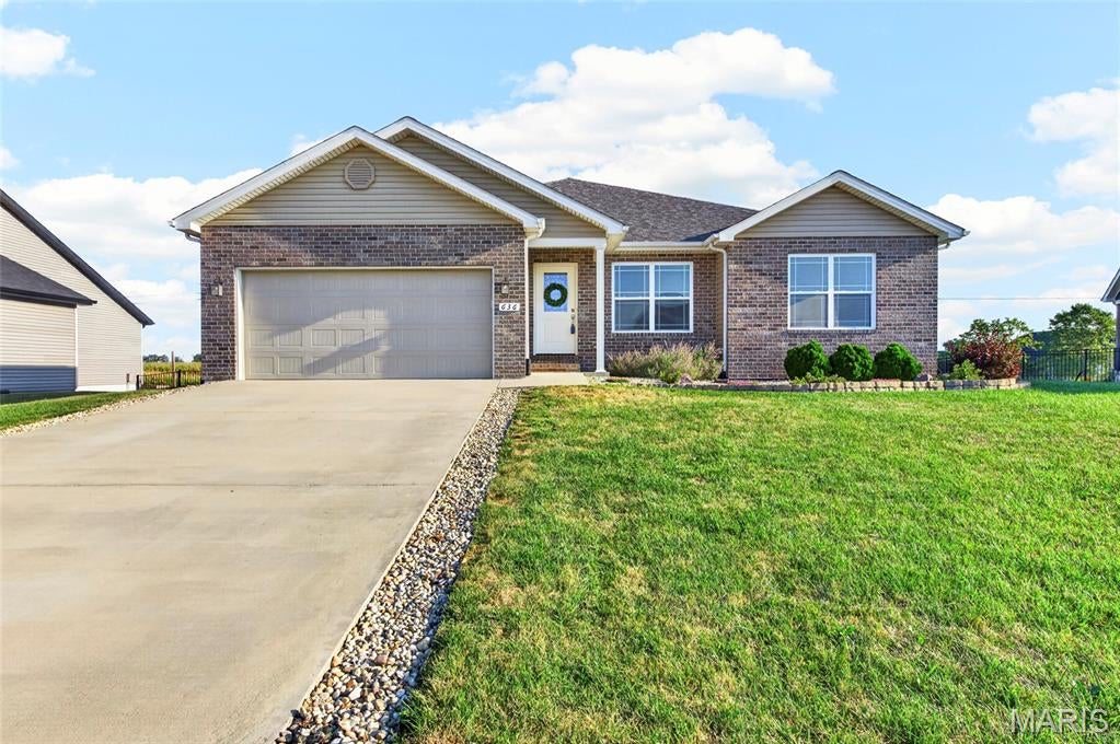 Spacious 4-bedroom, 2-bath ranch offers approximately 2,100 sq. ft. of main-floor living space, plus approximately 1189 sq. ft. of finished basement space and 1,000 sq. ft. of unfinished basement storage.
The open-concept main level features a vaulted ceiling in the great room and a well-appointed kitchen with quartz countertops, a large island with breakfast bar, upgraded cabinet storage solutions, and included kitchen appliances.
Each bedroom includes a walk-in closet. The primary suite features an en-suite bathroom with a double vanity, while the main-floor laundry room conveniently connects to the primary closet. A dedicated study with French doors provides additional flexible space for work or a quiet retreat. The finished basement(1189 sq. ft.) offers 9 foot ceilings, an additional bedroom with egress, an entertaining area, and a flexible room for a home theatre, gym or sauna, plus 1,000 sq. ft. of unfinished storage and a rough in for a future full bath.  Outside, the property features a fenced backyard, covered patio, and extended uncovered patio. The garage includes two enclosed parking spaces with an extended third bay for additional vehicle/storage space. Additional features include a water softener and reverse osmosis system.