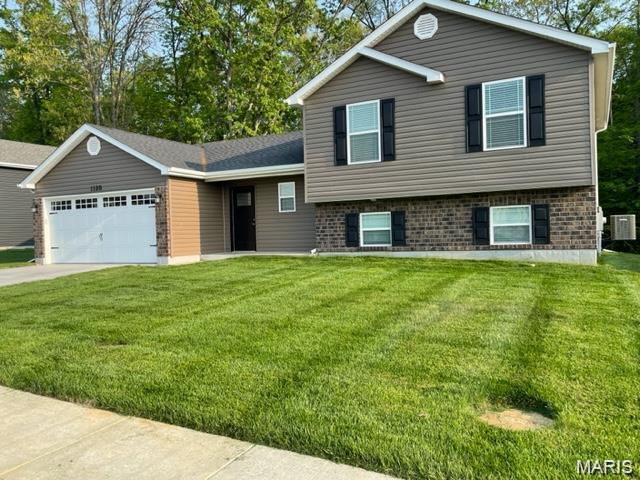 Ready to move-in! BRAND NEW home with every option you could imagine! They include vaulted ceilings, rounded “bullnose” corners, granite or quartz countertops, stainless steel appliances, 42" cabinets with "cushion close", custom neutral-colored paint job throughout, LVT flooring throughout most of the home, framed windows, taller baseboards, adult-sized cabinets in bathrooms with marble countertops, walk-in closets, upgraded carriage garage doors with openers on 2 CAR Garage, full bath rough-in, panel doors (many varieties), and upgraded water/light fixtures throughout the house!  Fully sodded yard (front/sides/back). *Pictures are of previously built homes. Builder/Broker* This home is USDA eligible.