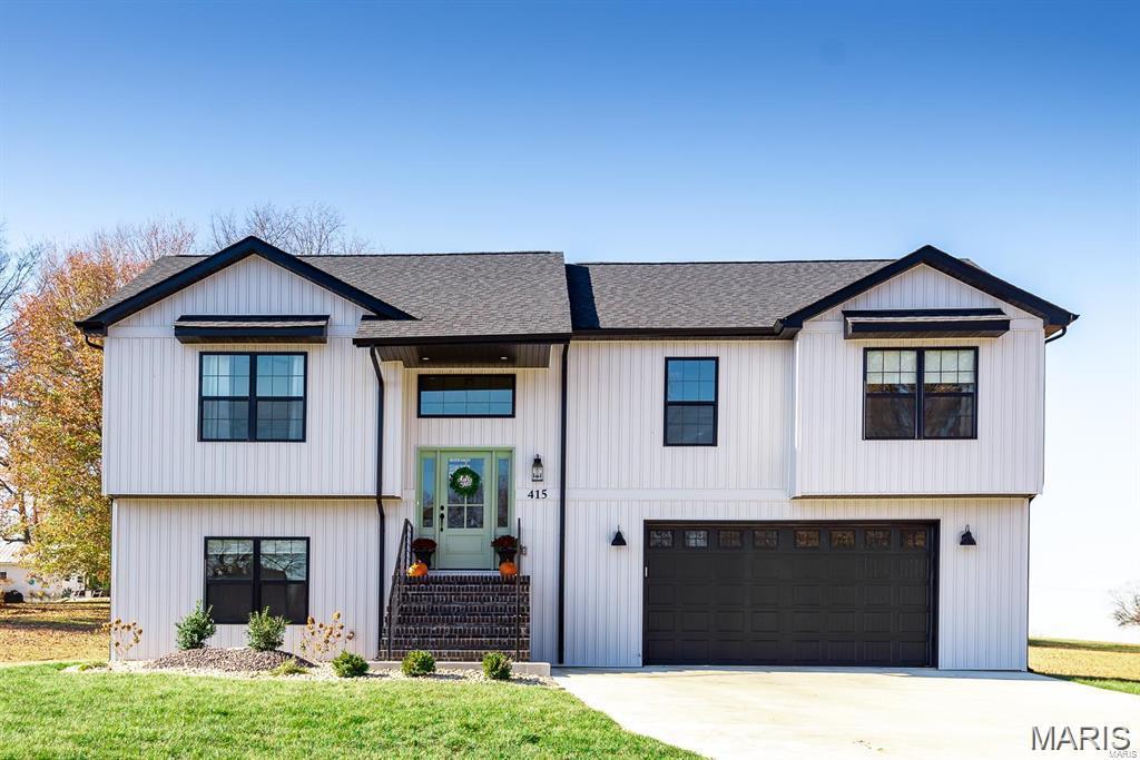 COMING SOON!!  Photos are of a different home, but the same floor plan and finishes. The exterior is not the same color, and this home will have a 1/2-wall of brick.  Looking for a brand new construction?  Well, here it is, this 4-bedroom home has everything you can want and so much more. 4 large bedrooms, 3 full bathrooms, large eat-in kitchen with oversized island, custom cabinets, LVP throughout the main living area, wood beams in the living area, custom stair rail, top-of-the-line lighting, extra can lighting, covered deck, and oversized poured patio below. This home can be ready in under 30 days. The property has an oversized garage and 2 sliding glass doors, one upstairs and one downstairs. You will be impressed. Please note that the photos are from the same floor plan but not from the subject house. The biggest differences are the brick halfway up on this home and the master bathroom, which has just a walk-in shower and no tub.  Front steps leading up to the home are different as well.  Home could be complete within 35 days.