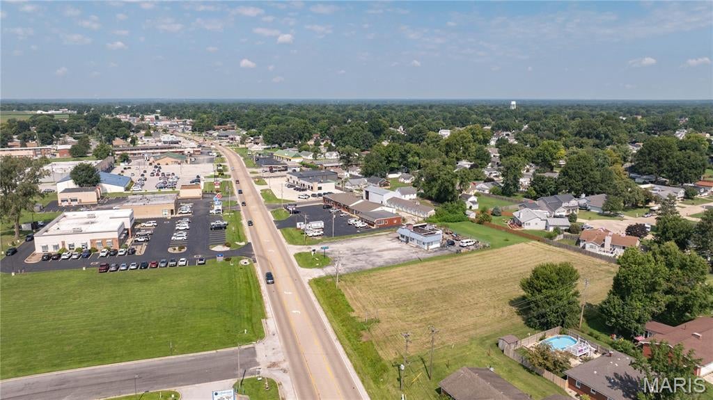 Position your business for success with this exceptional 0.95+/- acre commercial parcel in one of Bethalto's most visible and highly traveled locations. Zoned commercial, this property offers outstanding frontage along a major highway corridor, providing excellent exposure to thousands of passing vehicles each day and easy access for customers, clients, and employees.