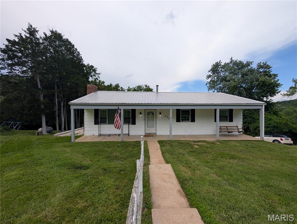 Hold the horses! This four bedroom two bath located in a lake community has been lovingly renovated and features a   Large duck overlooking the private backyard and the patio. In the coming soon status, So make plans to see this one as soon as it's active!