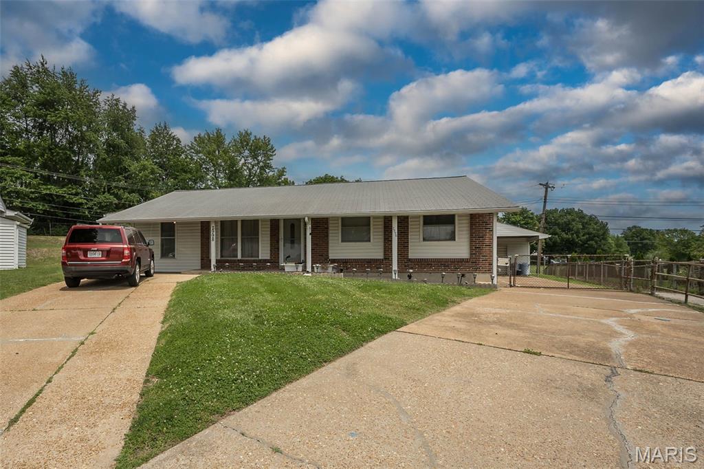 First time on market-estate of original owner is selling. 3 Bedroom ranch home w/ large level lot (.28 acres) with a Giant Oversized Detached 2+ Car Garage ( 27 W x 30 D). You can have a boat, workshop or lots of other options plus a 3 car carport! Main floor living room with hardwoods, Large kitchen/dining room combo, family room, Primary bedroom w/ half bath, 2 more bedrooms all with hardwoods plus a full bath. Lower level has spacious rec room, office, half bath and plenty of storage. Newer electric panel, tilt in windows. Amazing fenced yard also has cover patio and separate storage shed. Home is being sold "AS-IS" and is priced to sell!!!! Inside photos being taken Tuesday 6/9 after estate sale this weekend. Showings start Friday 6/12. Open House Sun, 6/14.