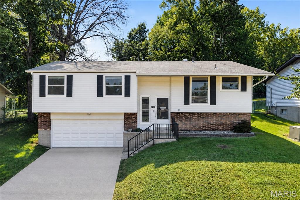 Come discover the warmth and charm of this beauty in the sought after Parkton community with an abundance of amenities from two fully stocked lakes, an amazing playground, basketball courts, tennis courts to a large pool and baby pool to all kinds of social activities.  But let's take a look at the home that greets you.  On the main floor, this stunner offers 3 bedrooms and 2 full baths with lots of upgrades.   There is a brand new 50 gallon hot water heater for the nice long hot showers you will take in your new shower in the primary bath!   Rich Luxury Vinyl flooring runs throughout, all new windows and custom cut blinds.  Moving to the lower level, you will find a newly remodeled family room with can lights and special color changing lighting, an amazing brick wall decor and an impressive wood ceiling plus lots of storage and the laundry room.  The family room leads out to the deep, oversized garage complete with a workshop and insulated garage door!  But there's more... the backyard is fully fenced, level, and backs to trees for loads of privacy!  You will enjoy the cool fall nights around the firepit or sitting on the freshly poured patio.   Shed included!  Just announced... AT&T Fiber has come to the neighborhood to join Charter for your choices!  This home provides a comfortable and lovely inviting atmosphere providing the opportunity to embrace a relaxed lifestyle while still having ample space for all your needs!