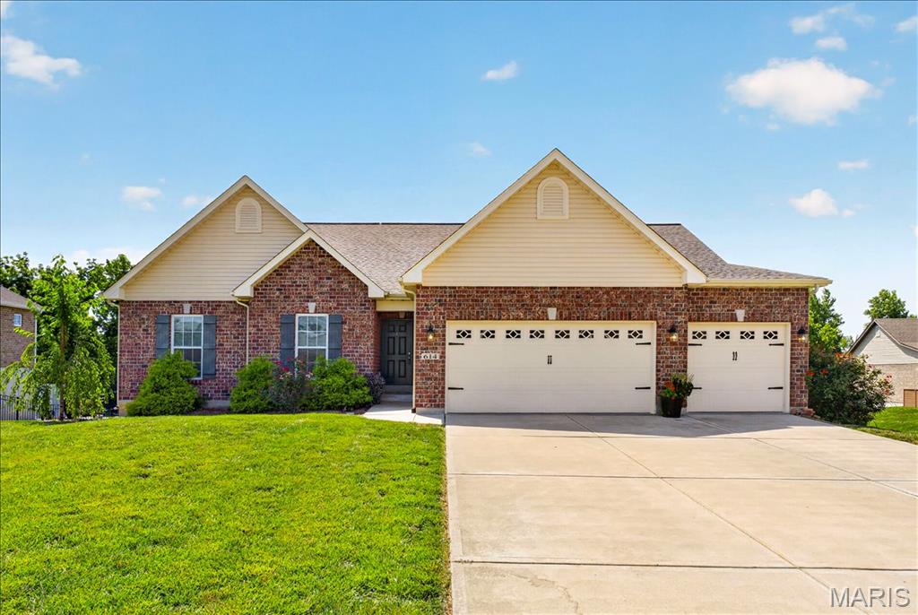 Tucked on a quiet cul-de-sac and backing to a private wooded setting, this stunning 2017-built ranch in Columbia's Village of Wernings offers nearly 3,300 square feet of finished living space on a beautifully maintained .77-acre lot — with the outdoor lifestyle to match.  

Soaring 12-foot ceilings in the open-concept great room, kitchen, & dining area create a dramatic first impression, while 9-foot ceilings throughout the rest of the main level keep the feel expansive &  airy. Crown molding, transom windows, and abundant natural light complete the picture. The kitchen is designed for real living — 42-inch cabinetry, solid surface countertops, gas range, stainless appliances, a generous center island, and a large walk-in pantry. The primary suite is a true retreat, featuring a soaking tub, walk-in shower, & adult-height vanity. Two additional main-floor bedrooms, a second full bath, & main floor laundry add to the homes well designed layout.  

The finished walkout lower level is the home's crown jewel — a full second living floor complete with 9-foot ceilings, a spacious rec room, dry bar area, fourth bedroom with egress, & a third full bath. Walk straight out to one of the most impressive outdoor setups in the area: a covered patio beneath the maintenance-free deck, finished with outdoor lighting, mounted TV (included in sale), & a dedicated space perfect for entertainment. The maintenance free deck overlooks a fully fenced .77-acre lot with mature wooded backdrop, a concrete patio, & a garden.  A standard 3-car side-by-side garage — large enough for a full-size dually — completes a home that delivers exceptional space, smart layout, & true lifestyle features — this home is private, functional, & completely move-in ready.   

Location....Location....Location.  Just minutes to parks, coffee shops, wineries, the GM&O Heritage Trail, local schools, Catholic grade school, & local farmers market. A short drive to St. Louis & all major interstates — offering the perfect blend of small-town charm and city convenience. This is the one you've been waiting for!