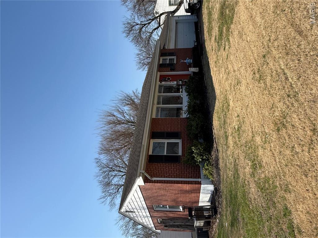 Charming and move in ready! This super cute 3 bedroom 2 bath brick ranch sits proudly on a desirable corner lot in a convenient location. Step inside to find a spacious layout featuring a large family room perfect for relaxing and entertaining. This home features a partially finished basement which offers additional living space. Numerous updates throughout that add modern touches while maintaining its cozy appeal. Enjoy outdoor living with a huge patio area, ideal for gatherings, grilling or simply unwinding.