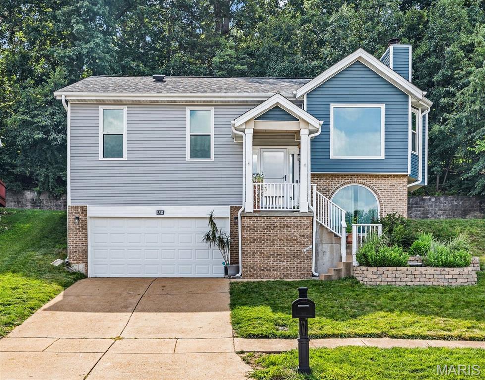Beautifully maintained and updated 3-bedroom, 3-bathroom, split level home offers the perfect blend of space, comfort, and workspace for everyday living.  Close to shopping and entertainment as well, a few of the features include 12' vaulted ceilings, wood burning fireplace, updated kitchen, hardwood flooring in the kitchen and family room, and new windows with a transferrable warranty to name just a few.  A complete list of updates and additions is attached.  Did I mention that this home is located on a cul-de-sac for additional privacy?  If you are looking for space and privacy don't miss the opportunity to make this exceptional property your next home.