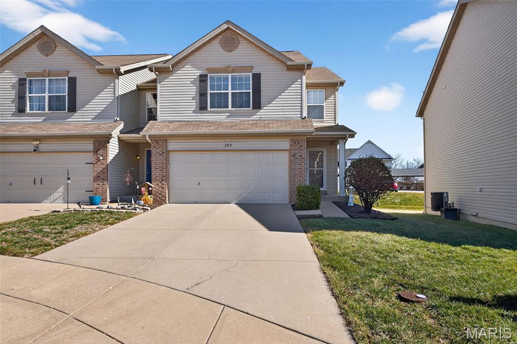 Welcome to 263 Shady Rock Lane, O’Fallon, MO 63366, a beautifully maintained home nestled in one of the most desirable communities in the heart of O'Fallon.

Step inside to discover a bright, open concept main living area highlighted by gorgeous hardwood floors and neutral designer tones. The spacious living room features a ceiling fan, large windows that bring in an abundance of natural light, and ample space for relaxing or entertaining. The layout flows seamlessly into the kitchen and breakfast area, creating a comfortable and functional everyday living space.

The kitchen offers stainless steel appliances, including a smooth top range, built-in microwave, and dishwasher, along with abundant cabinetry, generous counter space, and a convenient breakfast bar. Just off the kitchen, the cozy breakfast nook features a modern light fixture and French doors leading to the backyard, providing easy indoor-outdoor living and plenty of natural light.

The open floor plan makes hosting effortless, while the warm wood flooring throughout the main level adds timeless appeal and durability. Thoughtful details and clean, well-maintained finishes make this home truly move-in ready.

Located minutes from shopping, dining, parks, and major commuter routes, this home also offers convenient access to everything Missouri has to offer.

If you’re looking for style, comfort, and functionality in a prime location, 263 Shady Rock Lane is ready to welcome you home.