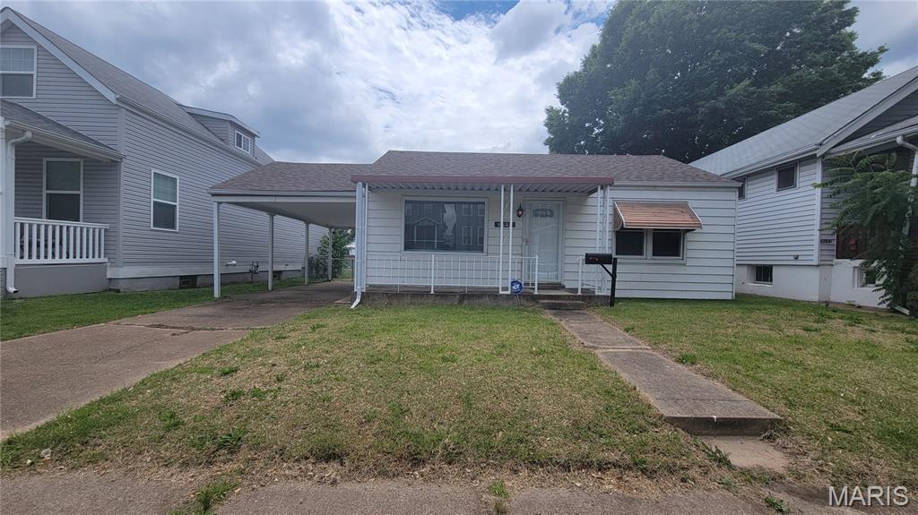 A covered front porch welcomes you into this 2 bedroom gem in Lindenwood Park. Hardwood floors run throughout the living room and bedrooms. The kitchen is large enough to eat-in, and a washer and dryer are included in the main floor utility room. There is also a covered back patio and a 2 car garage. This one is ready for immediate occupancy.