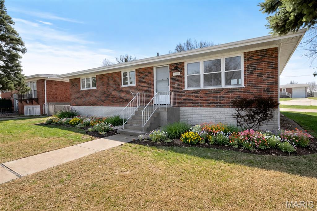 Welcome Home! This charming and well-maintained 2 bed, 2 bath property nestled on a quiet cul-de-sac corner lot! Step inside to find beautiful gleaming hardwood floors and a bright, inviting living space. The updated bathroom features a newer vanity and toilet, while recent big-ticket upgrades—including roof, windows, gutters, downspouts, and water heater—offer peace of mind.

The finished basement adds valuable extra living space along with a convenient half bath, perfect for a second living area, home office, or guest space. Enjoy the spacious backyard with a storage shed and the convenience of a rear-entry garage. A perfect place to call home!

Located in the Bayless School District, you’re just a short walk to the elementary, junior high, and Bayless High School—making daily routines simple and stress-free. A great place to start your homeownership journey!