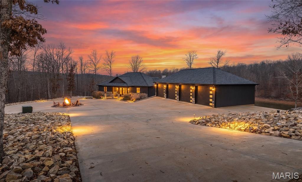 This stunning turnkey property is located a mile away from Lake Wappapello, along Highway D. The property consists of a custom home built in 2022, a four-car garage with heat, and a 40 ft by 40 ft shop with custom shelving, perfect for keeping your equipment and implements out of the weather. The 3-bedroom, 2-bathroom home has an open-concept layout and would make for a perfect full-time residence or a great place to entertain guests on the weekend. The home overlooks the stocked pond with a new dock and gives you an opportunity for some fishing, waterfowl hunting, or a place to view the bald eagles in the area. The excellent trail system leads you all around the farm, and with multiple access points to the property, so you have a great chance of having a successful hunt no matter the wind direction. Several food plots are in place with shooting houses, making this an awesome turnkey hunting setup. The property has been strategically designed, and the abundant amount of wildlife it holds speaks for itself. Lake Wappapello is a mile away, where you can enjoy additional fishing, boating, and waterfowl hunting. If this is not enough acreage to get the job done on a mature whitetail or turkey, the Corps of Engineers land adjoins the property. Whether you are looking for a permanent residence or an ultimate weekend getaway property, this one-of-a-kind farm is a must-see! Call today to schedule your own private tour.