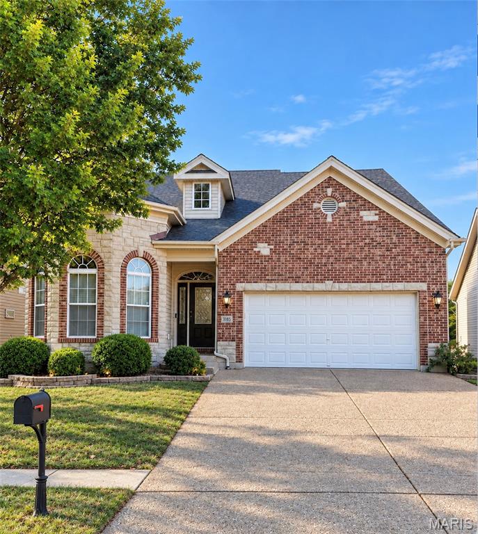 Picture yourself at home creating lasting memories in a space where every room feels warm, inviting, and designed to bring people together. Ideally located in the Orchard Farm School District, this exceptional home offers the perfect blend of peaceful neighborhood living with convenient access to Historic St. Charles, New Town, shopping, dining, parks, and Highway 370, making it easy to enjoy everything the area has to offer. Buyers are encouraged to independently verify schools and any information important to their purchasing decision.
Step inside and prepare to be impressed from the moment you walk through the front door. Soaring cathedral and coffered ceilings, dramatic arched windows, rich hardwood floors, plantation shutters, and walls of natural light set the stage for nearly 2,900 sq ft of beautifully designed living space. The stunning two-story great room with gas fireplace flows effortlessly into a chef-inspired kitchen with new KitchenAid appliances, granite countertops, cherry cabinetry, and breakfast bar. A main-level owner’s suite offers a spa-like retreat, while upstairs features two spacious bedrooms, a Jack-and-Jill bath, and an impressive 16' loft overlooking the great room. Outside, a maintenance-free deck overlooks the fenced backyard, while the lower level offers exciting possibilities for future living space. Distinctive, beautifully maintained, and move-in ready—this is a home you’ll remember long after the showing ends.