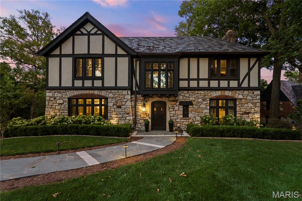 Welcome to “The Modern Gatsby,” a masterfully restored 1927 architectural treasure approaching its centennial. Built by hand in an era of uncompromising craftsmanship, 1022 showcases natural stone, hardwood timbers, soaring plaster ceilings, arched solid wood doors, original iron railings, and hand forged hardware. These are details that simply cannot be recreated today. Its legendary Prohibition era speakeasy features a private entrance, concealed bar, rounded fretwork ceiling, backlit stained glass, decorative crests, and an original “Gentlemen” sign. It is as unforgettable for entertaining today as it must have been in 1927. Six years of painstaking restoration followed one uncompromising rule: modernize everything that should be modern while preserving everything that can never be replaced. No detail was considered too small, and no decision was made casually. The original room based architecture was honored rather than erased, with historic doors, millwork, iron railings, and architectural elements carefully preserved and woven into the home’s renewed design. Even the original study was thoughtfully transformed into the primary suite closet, allowing an important historic space to begin an elegant new chapter. The kitchen was completely transformed into a truly extraordinary gathering space with Starmark cabinetry, Thermador appliances, and Visual Comfort lighting. The luxurious primary suite was extensively reimagined with beautiful marble finishes, abundant custom storage, a seated vanity, and its own fireplace. In the dining room, a spectacular Schonbek chandelier catches the setting sun and casts hundreds of tiny rainbows across the room during golden hour. The renovations continue seamlessly outdoors. A dramatic bar room bridges the interior and exterior through windows that open like double doors, creating an effortless connection to expansive stone terraces, an outdoor kitchen, and a wood burning fireplace. New patios and retaining walls enhance the grounds, while a mature tree canopy and natural breeze create a remarkably comfortable outdoor retreat. The sizeable, partially fenced property offers an exceptional setting for memorable gatherings, quiet mornings, and future possibilities. The practical renovations are every bit as impressive as the visible transformation. Major improvements include a younger slate roof, four newer zoned HVAC systems, a newer boiler, two newer water heaters, extensively updated electrical service and plumbing, a new drainage system and sump pumps, extensive tuckpointing, select new windows and doors, and a freshly patched and sealed driveway. Together, these improvements represent years of careful planning, significant investment, and responsible stewardship. Historic grandeur. Modern comfort. Nearly a century of stories. Its finest chapter may be next. See feature sheet for extensive list of updates, upgrades and repairs including kitchen, primary, all bathrooms, tuck pointing, and most major systems (plumbing, electric, HVAC).