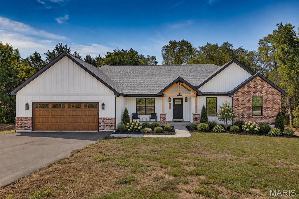 Looking for a 4 bed, 2 bath home in the Farmington School District? Congratulations, you just found it.

With over 2,100 sq ft of living space plus an unfinished walk-out basement, there is plenty of room to spread out now and even more potential for later. The basement is already roughed in for a bathroom, so you can finish it when you’re feeling ambitious.

Sitting on 3 level acres, you get space to breathe while still being just minutes from town. Best of both worlds without the long gravel road commitment.

Inside, the open floor plan is made for real life and entertaining, featuring quartz countertops, a large island, walk-in pantry, and a built-in pot filler because carrying heavy pots is overrated. Custom lighting, coffered ceilings, and black tinted windows bring all the modern farmhouse vibes.

The split bedroom layout gives everyone their own space, with three bedrooms and a full bath on one side and a private primary suite on the other. The primary bathroom really delivers with TWO separate vanities, each with its own sink, lighting, and mirror, so no one is fighting for counter space. You also get a soaking tub, separate shower, and two walk-in closets, because sharing is overrated.

You’ll also find a laundry room with cabinet storage and a utility sink, plus an attached 2-car garage to keep life convenient.

Four bedrooms, over 3 acres, and room to grow… this one is not going to sit around waiting forever.

Disclaimer: Some photos include virtual staging and landscaping for illustrative purposes only.