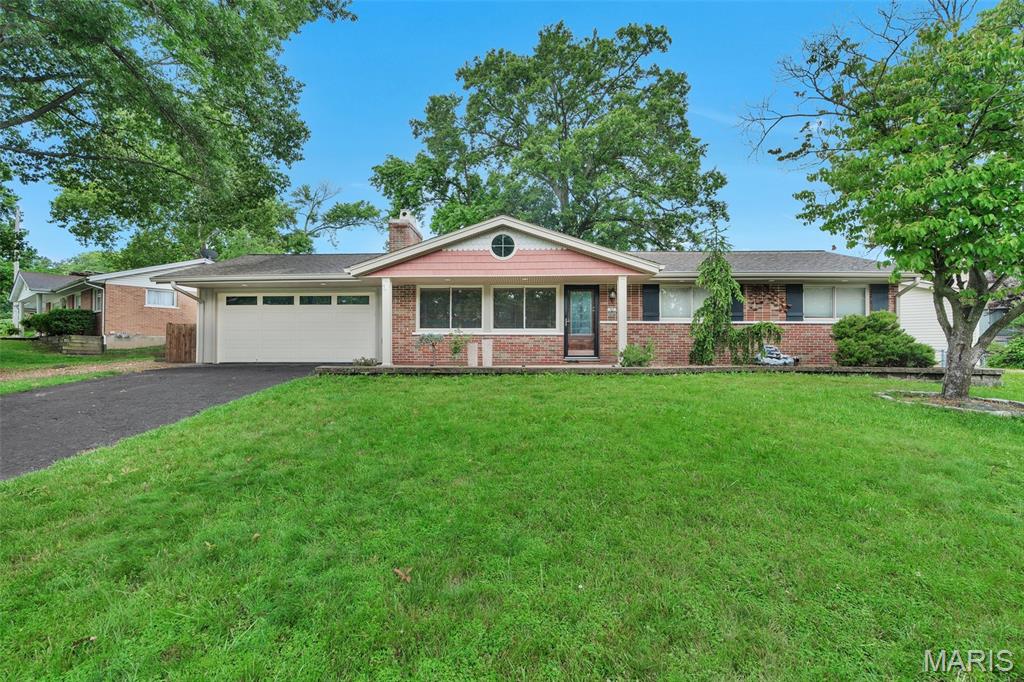Welcome to this beautifully maintained brick veneer home in the highly desirable Schaefer Gardens subdivision and award-winning Marquette High School district. Offering 3 bedrooms, 3 full bathrooms, and 1,901 square feet of comfortable living space, this home is filled with features that make it truly special.
Step inside to discover freshly painted interiors, a cozy living room with hardwood flooring and beautiful fire place, a large great room perfect for entertaining guests with heated flooring complimented with another cozy fireplace that adds warmth and charm throughout the home. The finished lower level provides exceptional flexibility with a full kitchen, living room, full bathroom, bedroom with a walk-in closet, and ample storage space—ideal for extended family, guests, or multi-generational living.
Situated on a premium corner lot, the outdoor space features a beautiful patio perfect for relaxing or hosting gatherings. Car enthusiasts and hobbyists will appreciate the rare combination of an attached 2-car garage and a separate detached 2-car garage located on the opposite side of the property, offering plenty of parking, workspace, and storage. Additional highlights include a tankless water heater for energy efficiency and convenience.
This move-in-ready home offers the perfect blend of comfort, functionality, and versatility in a sought-after location. Don't miss your opportunity to make it yours!