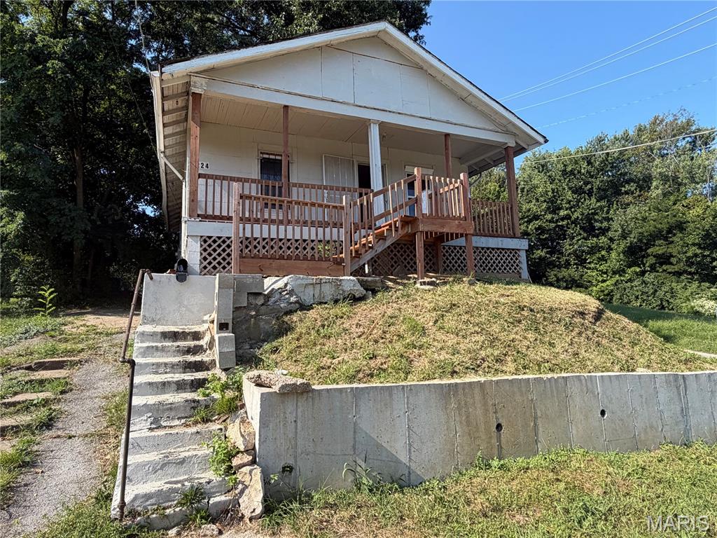 This 2-bedroom, 1-bath ranch-style bungalow offers an excellent opportunity for investors or owner-occupants alike. The inviting curb appeal features a newer covered front porch and stairs, along with newer concrete and a retaining wall in the front. Inside, you’ll find several recent updates, including some newer windows, six-panel doors, updated flooring, and fresh paint throughout. The spacious eat-in kitchen provides plenty of room for everyday meals and entertaining. Additional features include a newer roof, water heater, electrical panel, and PVC plumbing in the full basement, which offers valuable additional storage space. Off-street driveway parking adds convenience, while the overall layout and updates make this property a great opportunity to add to your investment portfolio or make your own. Property is being sold in As-Is condition.