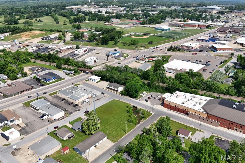 Prime C-2 commercial lot in one of Rolla’s fastest growing areas. Ready for development with imported soil and certified for building, this site is ideal for a building up to 5,000 sq. ft. Located near the intersection of Bishop Avenue and Highway 72, with strong visibility and surrounded by continued growth—including new nearby retail development (Aldi and Sonic)—this property offers an excellent opportunity for retail, office, warehouse, or service use in an expanding area of Rolla.